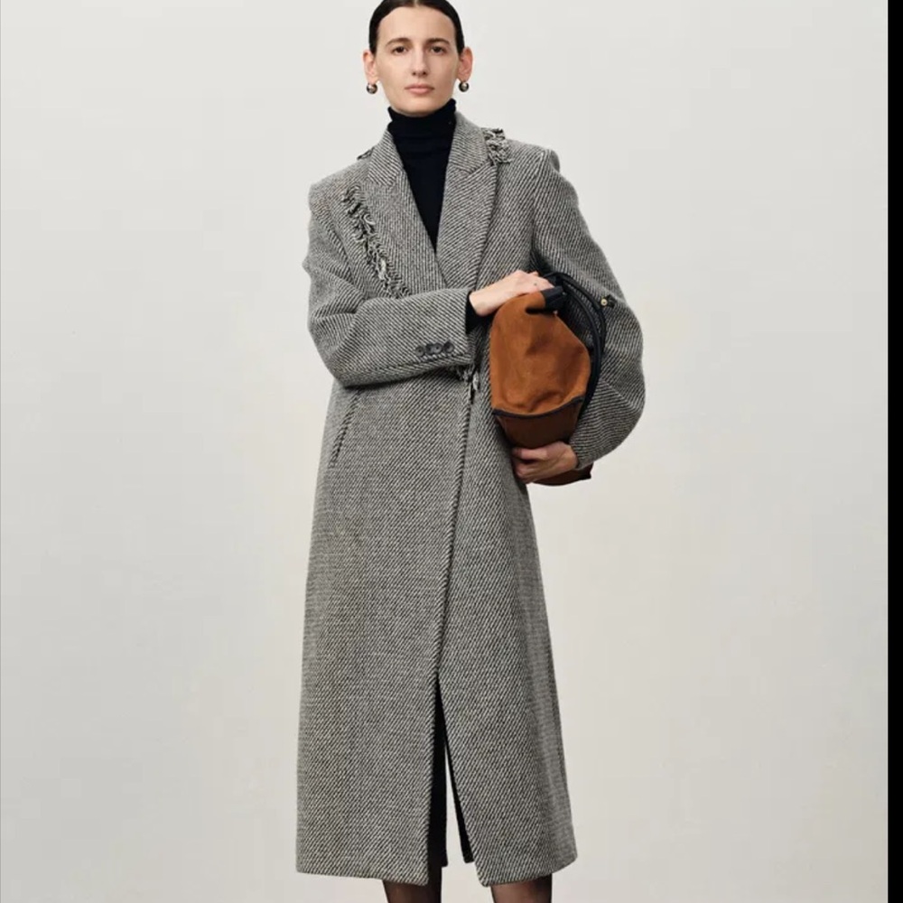 Sam Frenzel with Fabrique Sabine Asymmetric Fringed Wool Coat